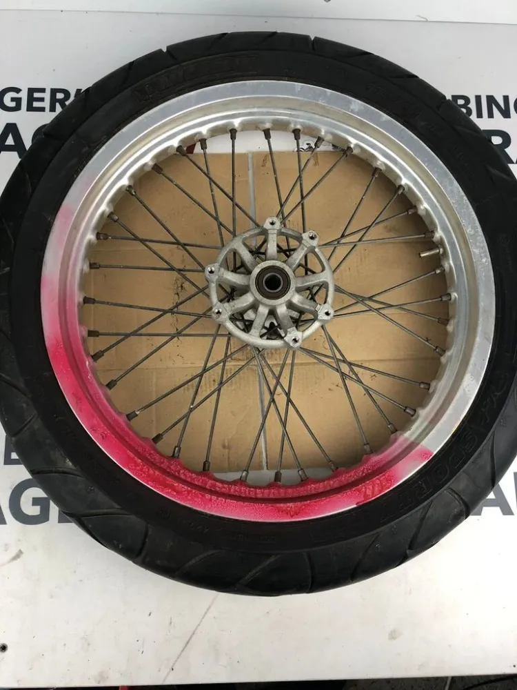 vordere Speichenfelge mit Reifen, Derbi/Aprilia/Gilera, 110/80-17, 15mm Achsdurchmesser